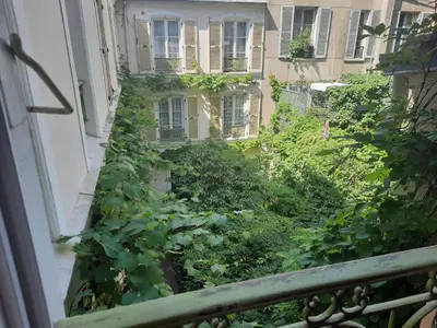 Jardin de l'établissement Chambres d'hôtes calmes sur jardin Paris Batignolles