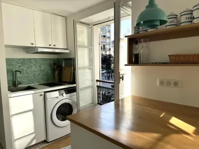 Cuisine ou kitchenette dans l'établissement Joli studio Jardin des Plantes