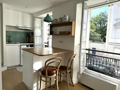 Cuisine ou kitchenette dans l'établissement Joli studio Jardin des Plantes