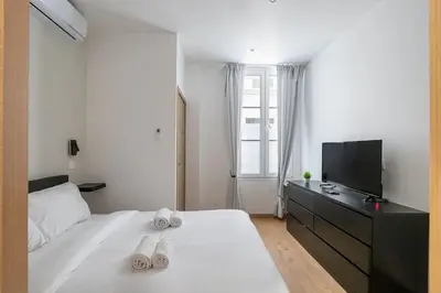 Un ou plusieurs lits dans un hébergement de l'établissement New two bedroom two bathroom apartment Paris 15 near Eiffel with air conditioning