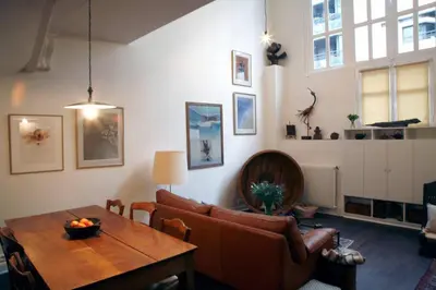 Coin salon dans l'établissement The Eifel Tower Artist Loft