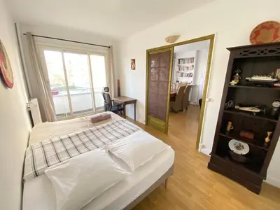 Un ou plusieurs lits dans un hébergement de l'établissement Chez Fiatope - Appartement Calme avec balcon & Parking, proche Tram T6