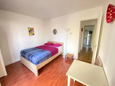 Un ou plusieurs lits dans un hébergement de l'établissement Chez Fiatope - Appartement Calme avec balcon & Parking, proche Tram T6