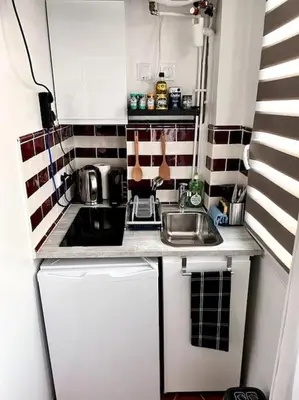 Cuisine ou kitchenette dans l'établissement Your sweet home