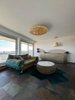 Coin salon dans l'établissement Panoramic Glam Appart à Neuilly-sur-Seine
