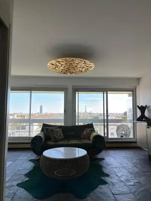 Coin salon dans l'établissement Panoramic Glam Appart à Neuilly-sur-Seine