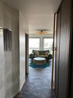 Coin salon dans l'établissement Panoramic Glam Appart à Neuilly-sur-Seine