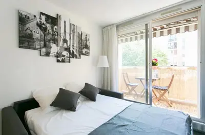 Un ou plusieurs lits dans un hébergement de l'établissement Appartement charmant proche Montparnasse