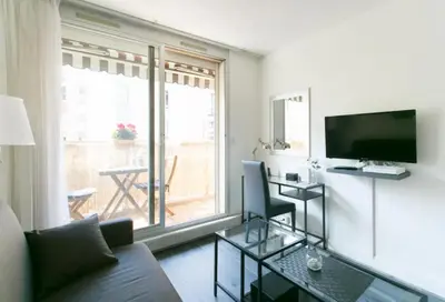 Télévision ou salle de divertissement dans l'établissement Appartement charmant proche Montparnasse