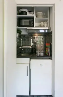 Cuisine ou kitchenette dans l'établissement Appartement charmant proche Montparnasse