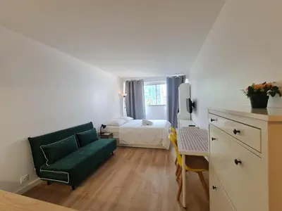 Un ou plusieurs lits dans un hébergement de l'établissement Super studio Paris La Défense