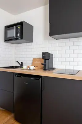 Cuisine ou kitchenette dans l'établissement Studio de Charme proche de Montparnasse