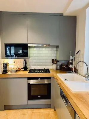 Cuisine ou kitchenette dans l'établissement Cosy Chic Family Flat in Paris