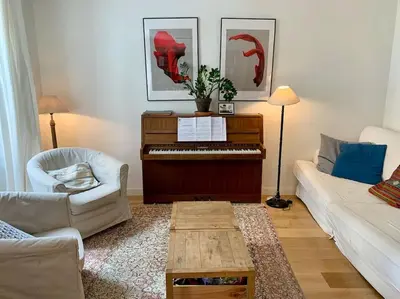 Coin salon dans l'établissement Cosy Chic Family Flat in Paris