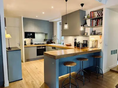 Cuisine ou kitchenette dans l'établissement Cosy Chic Family Flat in Paris