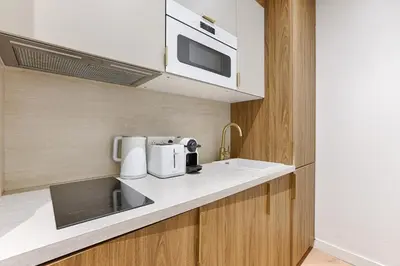 Cuisine ou kitchenette dans l'établissement Appartement de charme 1BR Condorcet Saint-Georges