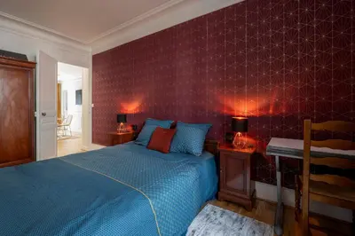 Un ou plusieurs lits dans un hébergement de l'établissement Art de Vivre - Très bel appartement à Paris
