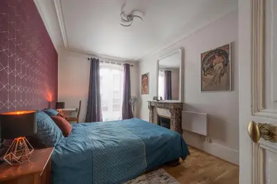 Un ou plusieurs lits dans un hébergement de l'établissement Art de Vivre - Très bel appartement à Paris