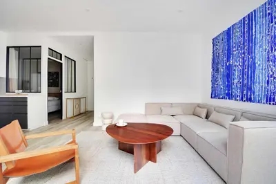 Coin salon dans l'établissement Charming apt with patio - 2BD4P - Monceau Park