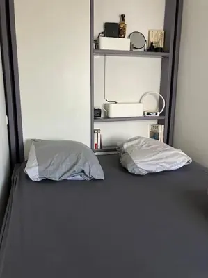 Un ou plusieurs lits dans un hébergement de l'établissement Central Paris Charming Flat