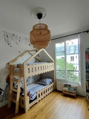 Un ou plusieurs lits dans un hébergement de l'établissement Beautifully designed homely calm parisian duplex