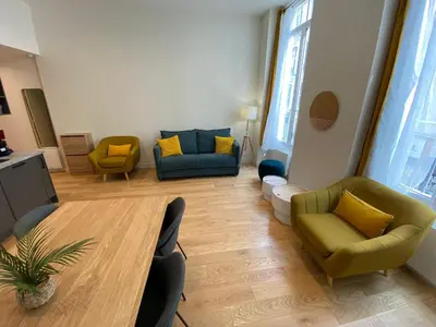 Coin salon dans l'établissement Appartement Aboukir