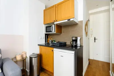 Cuisine ou kitchenette dans l'établissement Studio en Plein Centre de Paris