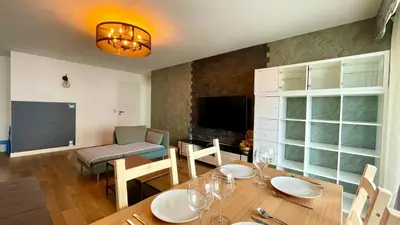Coin salon dans l'établissement 129 - Splendeur Confort et Modernité, Terrasse au Cœur de Paris