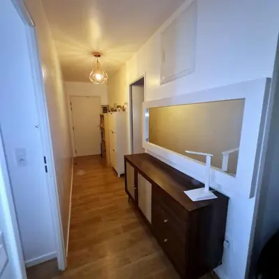 Cuisine ou kitchenette dans l'établissement Appart Cosy Family near JO2024