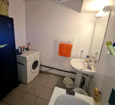 Salle de bains dans l'établissement Appart Cosy Family near JO2024