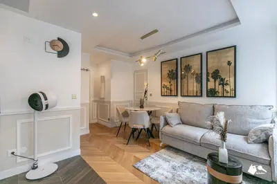 Coin salon dans l'établissement MBA - Louvres - Luxury Appartement