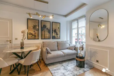 Coin salon dans l'établissement MBA - Louvres - Luxury Appartement