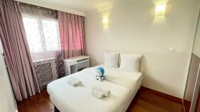 Un ou plusieurs lits dans un hébergement de l'établissement 108 - Spacieux Appartement de 90m2