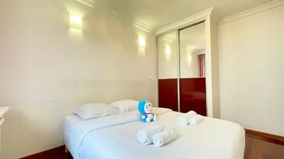 Un ou plusieurs lits dans un hébergement de l'établissement 108 - Spacieux Appartement de 90m2