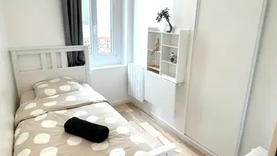 Un ou plusieurs lits dans un hébergement de l'établissement 117- Charmant Appartement Cosy pour 5 au Cœur de Paris