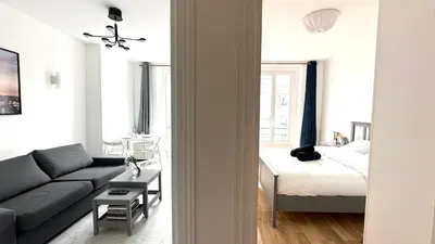 Un ou plusieurs lits dans un hébergement de l'établissement 117- Charmant Appartement Cosy pour 5 au Cœur de Paris