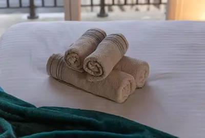 Un ou plusieurs lits dans un hébergement de l'établissement Authentic Parisien Suite -Paris historique -Metro
