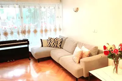 Coin salon dans l'établissement Appartement parisien et familial de 90m2