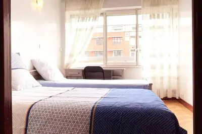 Un ou plusieurs lits dans un hébergement de l'établissement Appartement parisien et familial de 90m2
