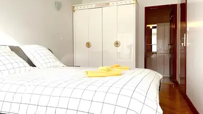 Un ou plusieurs lits dans un hébergement de l'établissement Appartement parisien et familial de 90m2