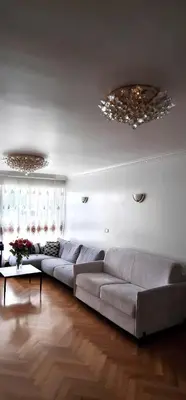 Coin salon dans l'établissement Appartement parisien et familial de 90m2