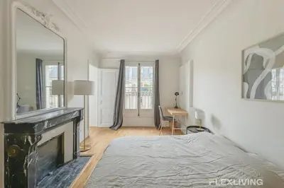 Un ou plusieurs lits dans un hébergement de l'établissement Flexliving - room - Turbigo