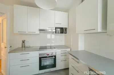 Cuisine ou kitchenette dans l'établissement Flexliving - room - Turbigo