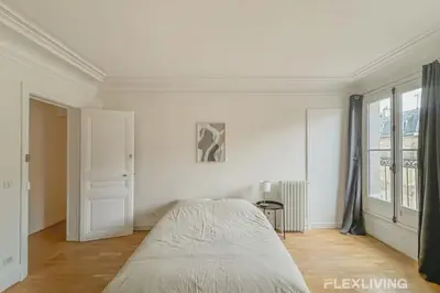 Un ou plusieurs lits dans un hébergement de l'établissement Flexliving - room - Turbigo