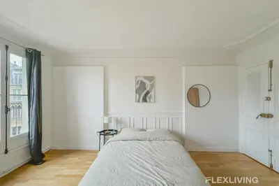 Un ou plusieurs lits dans un hébergement de l'établissement Flexliving - whole flat - Turbigo