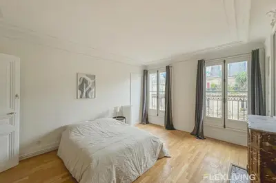 Un ou plusieurs lits dans un hébergement de l'établissement Flexliving - whole flat - Turbigo
