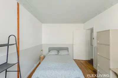 Un ou plusieurs lits dans un hébergement de l'établissement Flexliving - room - Hameau