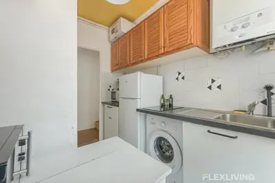 Cuisine ou kitchenette dans l'établissement Flexliving - room - Hameau