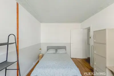 Un ou plusieurs lits dans un hébergement de l'établissement Flexliving - room - Paris 15