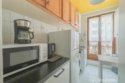 Cuisine ou kitchenette dans l'établissement Flexliving - room - Paris 15